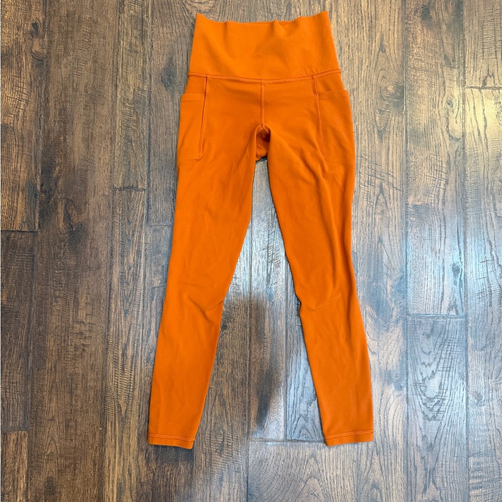 Athleta Salutation Stash Pocket II 7/8 Tight